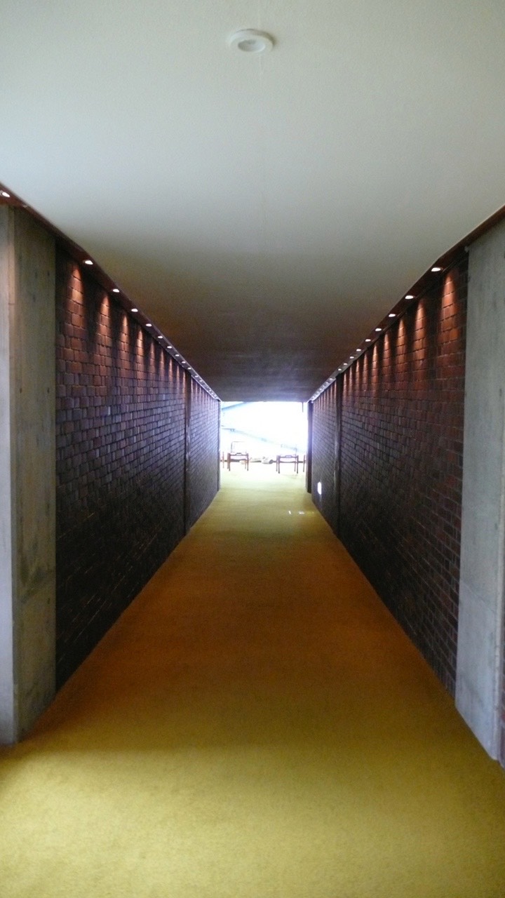 Ramp down to rooms wing   Ramp down to rooms wing